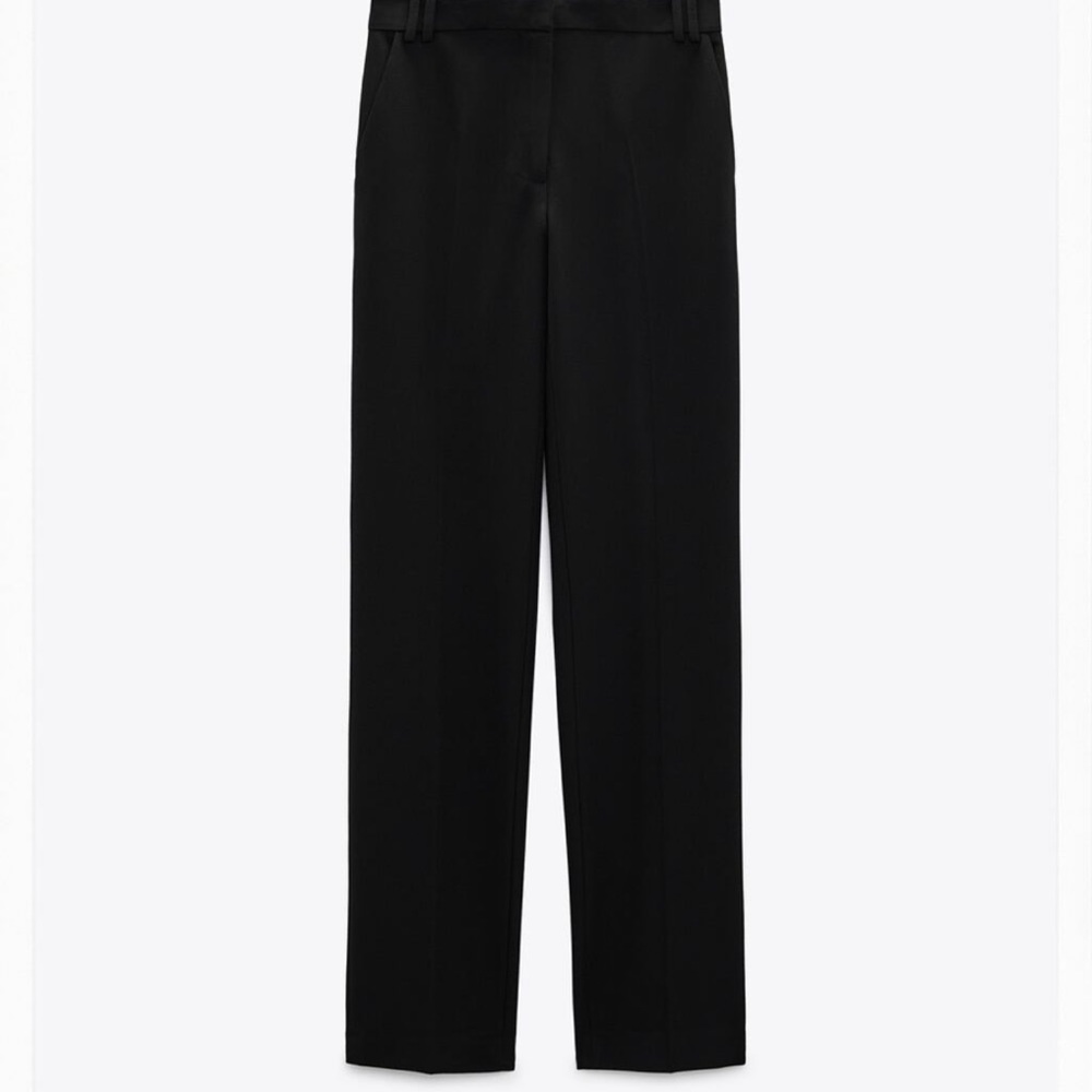 Black slim trousers by Zara